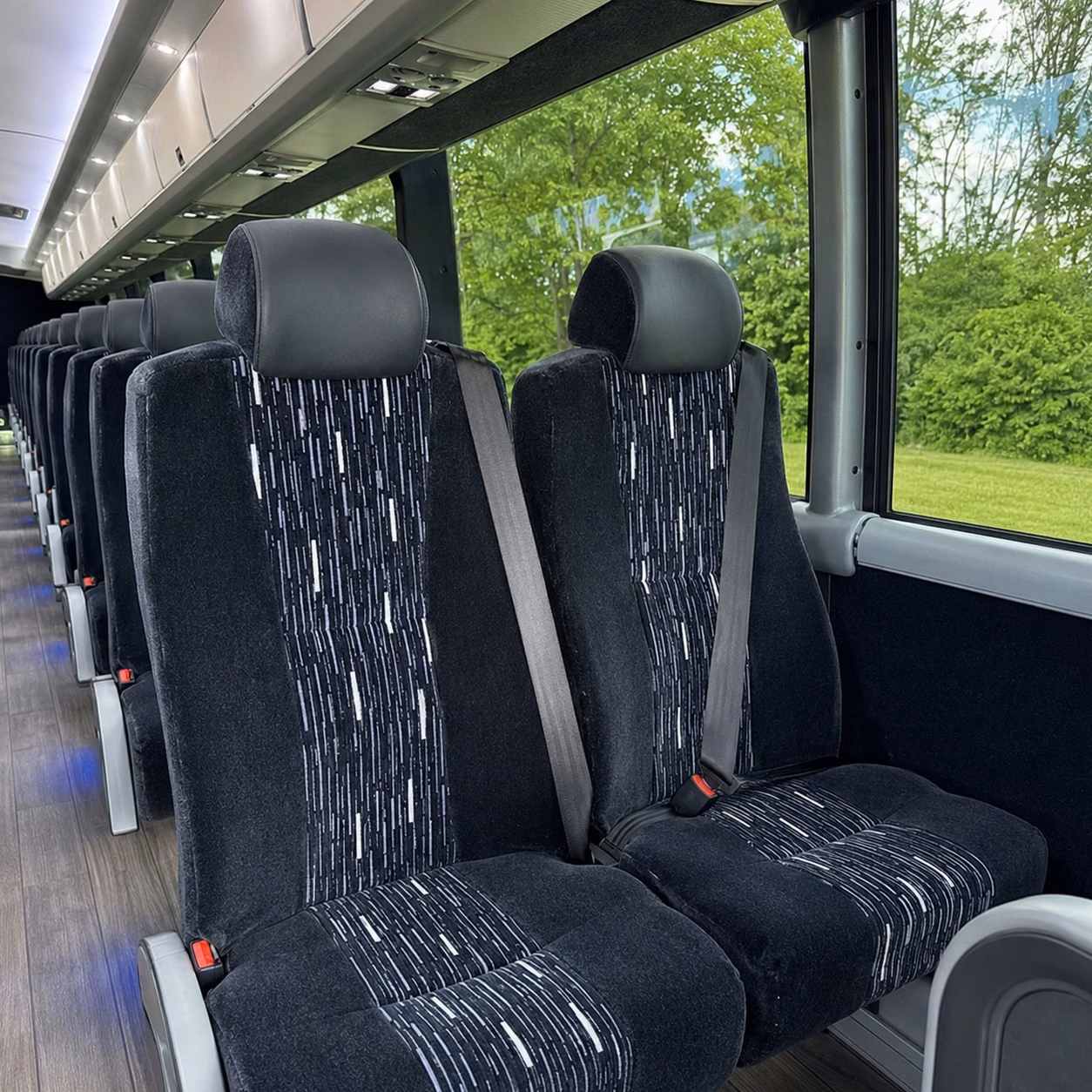 how bus type changes charter bus rental prices in portage michigan